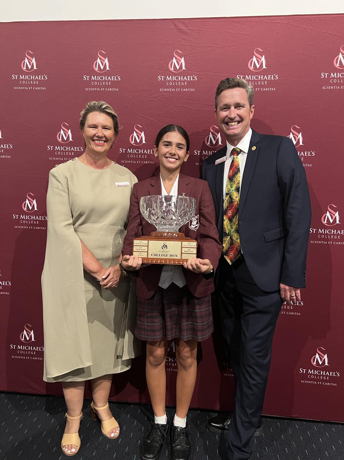 Student receiving College Dux award at Evening of Excellence ceremony
