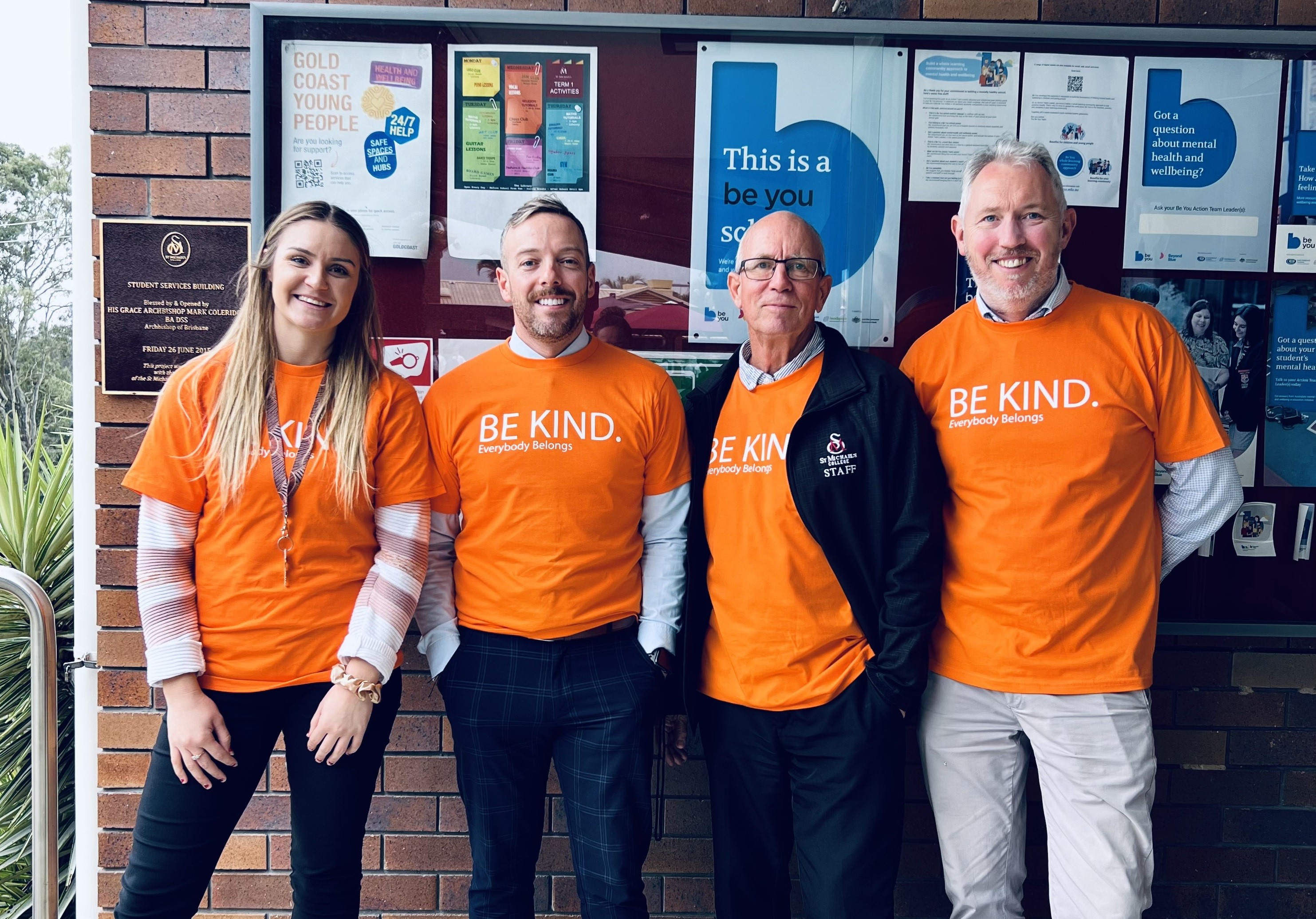 Staff members wearing BE KIND t-shirts to support on a good cause